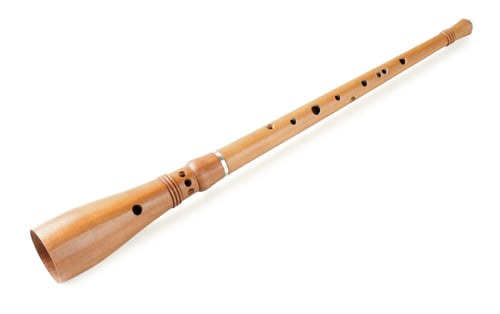 Preview: Vintage bryolka isolated on white. Woodwind musical instrument