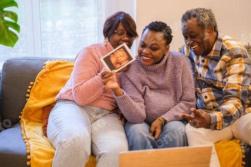 Preview: Single mother woman showing the ultrasound scan virtually with her proud parents