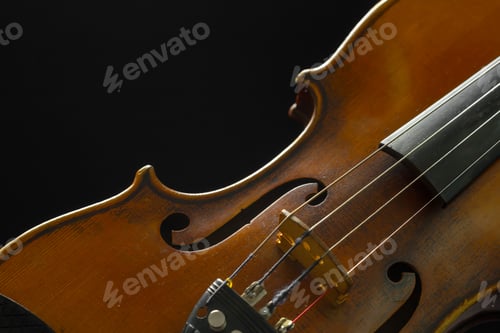 Preview: Old violin on a black background