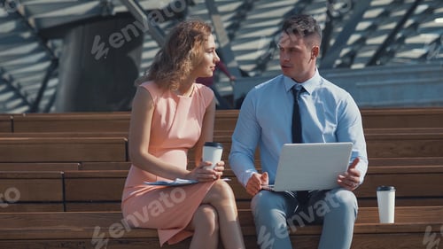 Preview: Young business people with laptop