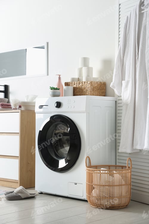 Preview: Washing machine and laundry basket in bathroom. Interior design
