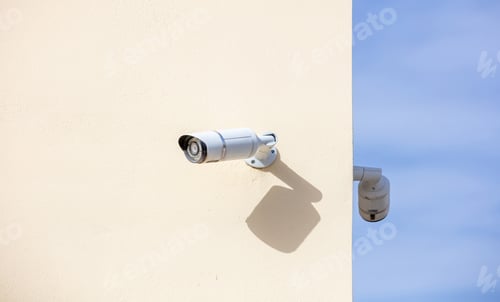 Preview: Security Cameras CCTV isolated on beige color wall background.