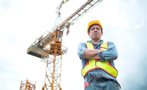 Preview: Portrait of crane worker uses walkie-talkie communicate with tower crane operators