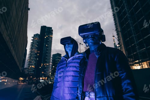 Preview: Two people experiencing virtual reality in an urban evening setting.