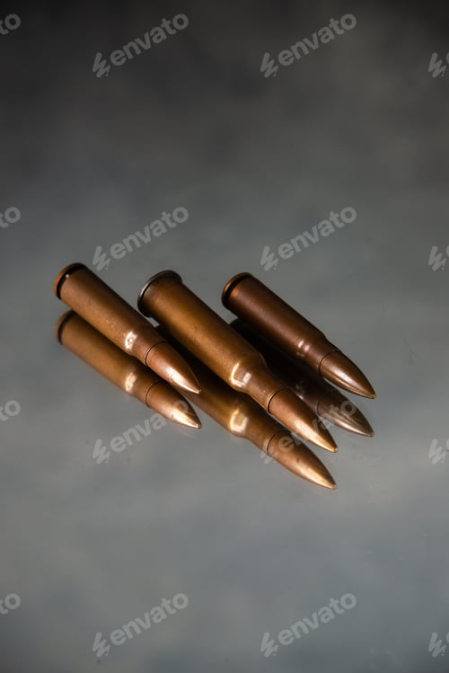Preview: brown bullets on the dark background gun tank death war shooting