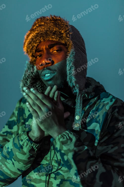 Preview: Black Ethnic man in warm clothes