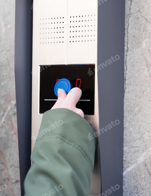Preview: Person entering security code on keypad access control system.