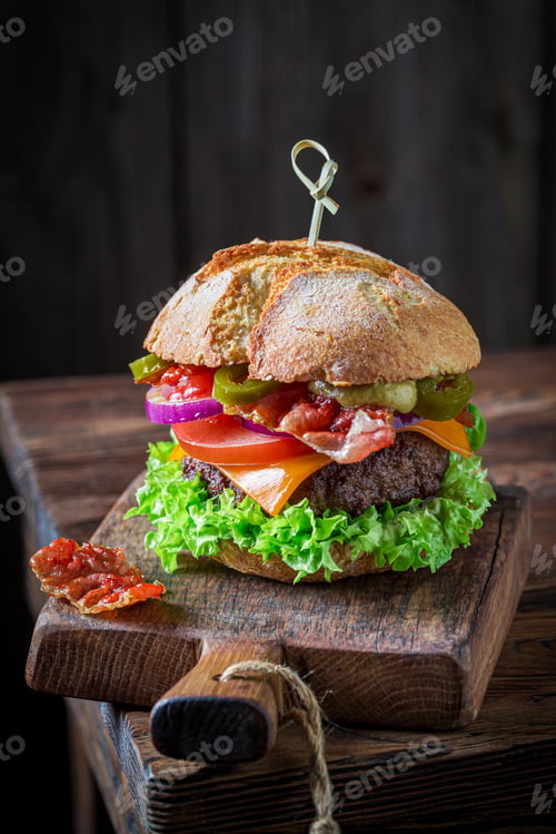 Preview: Burger made of onion, tomato and lettuce. American cuisine.