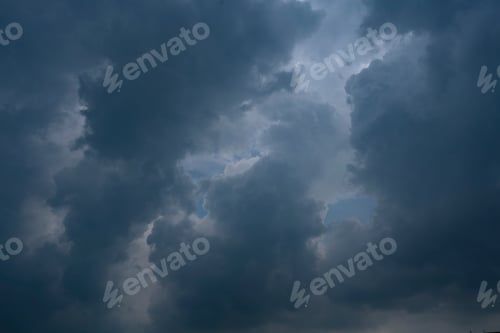 Preview: Evening sky with blue, white clouds.