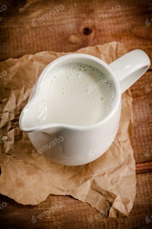 Preview: A jug of fresh milk on the table.
