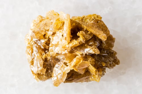 Preview: sample of rough cerussite mineral on white marble