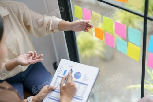 Preview: Business People working on sticky notes creative