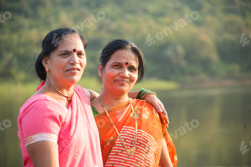 Preview: Happy two Indian women having fun at outdoar.