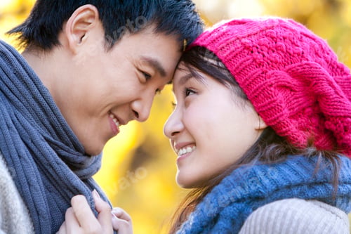 Preview: Young Couple Enjoying a Park in Autumn