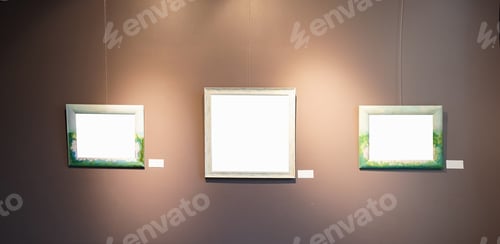 Preview: Blank picture frames on brown wall with glowing lamp, mock up