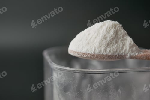Preview: Close up of baby milk powder on a spoon