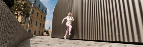 Preview: Middle eastern woman listening music with headphones while running