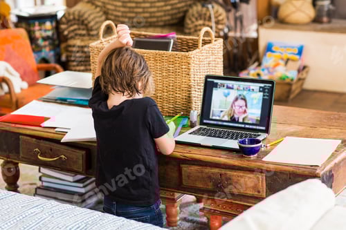 Preview: Child Learning Online at Home with Tablet Computer