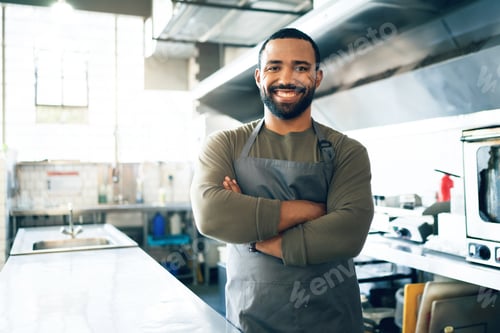 Preview: Happy man, chef and small business owner in kitchen at restaurant for hospitality service, cooking