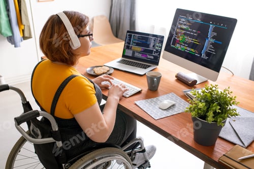 Preview: Woman Working at Desk with Computer