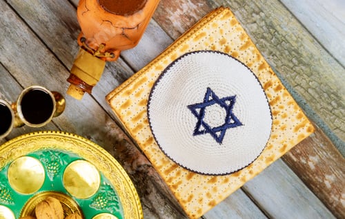 Preview: Pesah holiday celebration, matza unleavened bread and four cup kosher wine, jewish Passover holiday