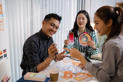 Preview: A group of UX/UI designers brainstorming creative ideas together