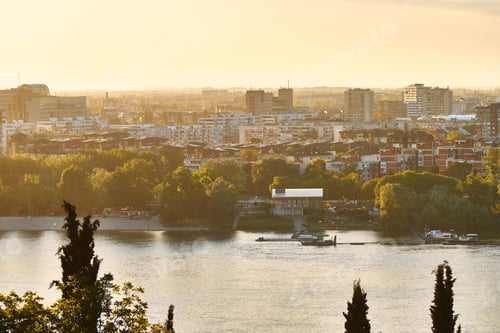 Preview: Cityscape of Novi Sad, Serbia and Danube river at sunset.