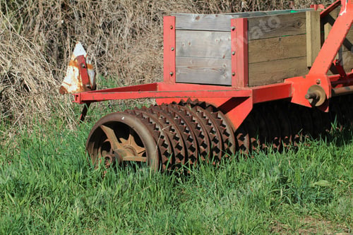 Preview: Closeup shot of an agricultural machine in a field