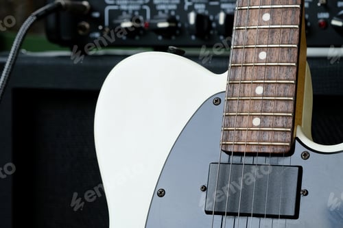 Preview: Electric guitar on the background of the guitar amplifier