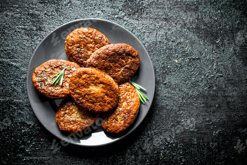 Preview: Cutlets on a plate with rosemary.