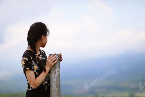 Preview: Candid of teenager having fun in outdoor nature mountainside landscape blur background
