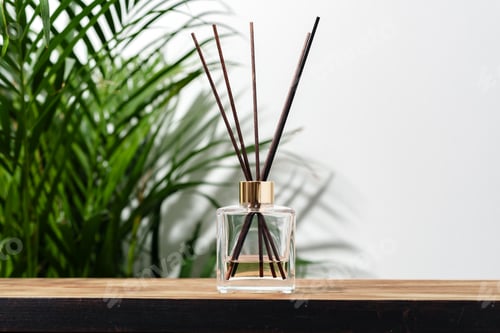 Preview: Glass Diffuser Bottle With Wooden Sticks on Wooden Tabletop