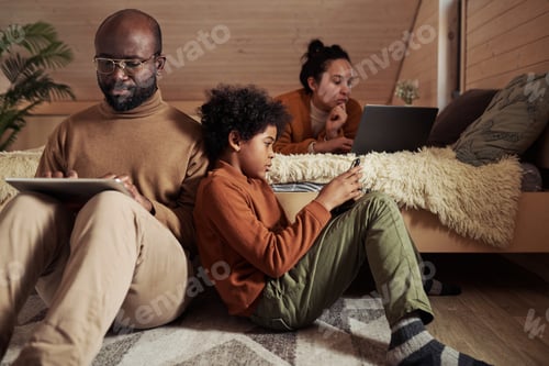 Preview: Boy with smartphone and his father
