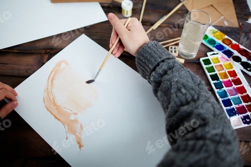 Preview: Painter Working with Paintbrush on a Blank Canvas