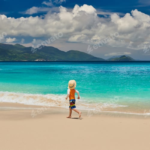 Preview: Three Year Old Toddler Boy Running On Beach. Summer Family Vacation At Seychelles, Mahe.