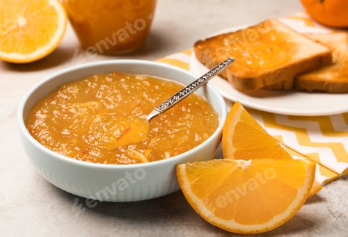 Preview: Delicious orange marmalade in bowl on light grey table