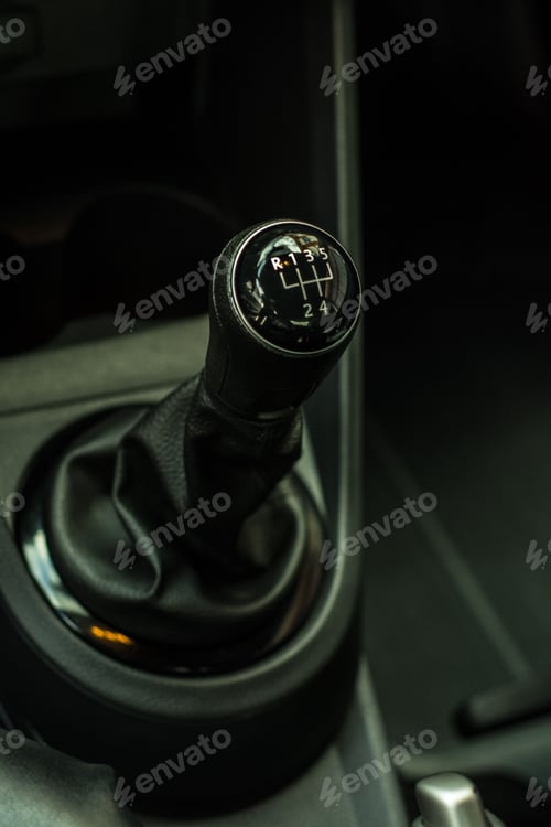 Preview: Vertical closeup of a manual gear stick, shift lever in an automobile