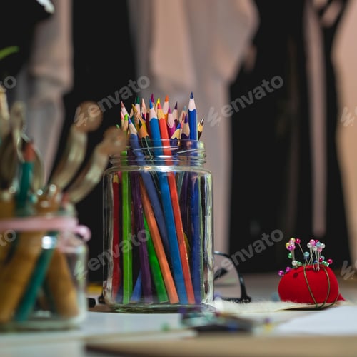 Preview: Desk of a fashion designer background concept.