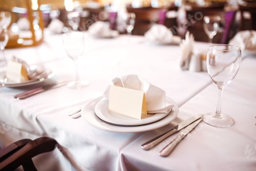 Preview: Banquet table with wedding and festive serving.Table covered with tablecloth and served with dishes.