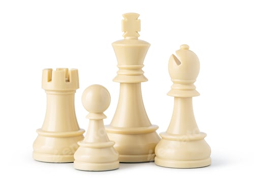 Preview: white chess pieces standing on white background