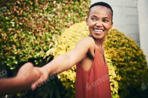 Preview: Lets run away from it all. Cropped shot of a happy young woman pulling her partner by the hand.