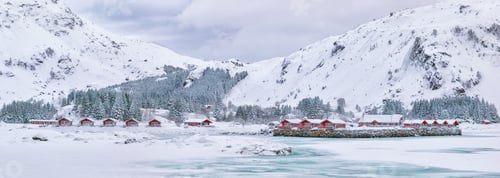Preview: Picturesque Winter Village Surrounded by Snow Covered Mountains