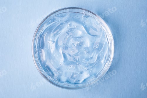 Preview: Top view of cosmetics gel with bubbly structure in the petri dish.Cosmetics banner with copy space.