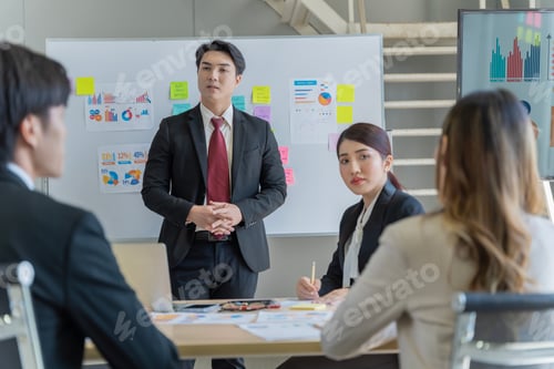 Preview: A group of young Asian businessmen Talking