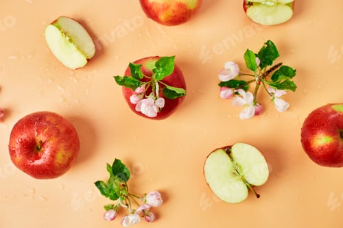Preview: Apple flowers and ripe red apples flat lay