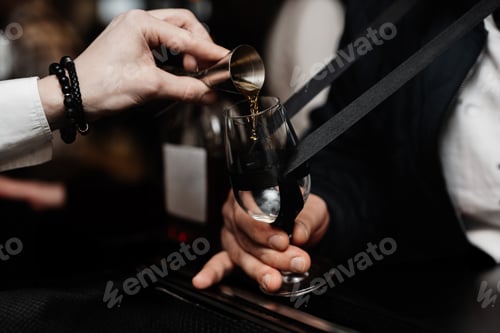 Preview: Bartender pours whiskey for tasting.