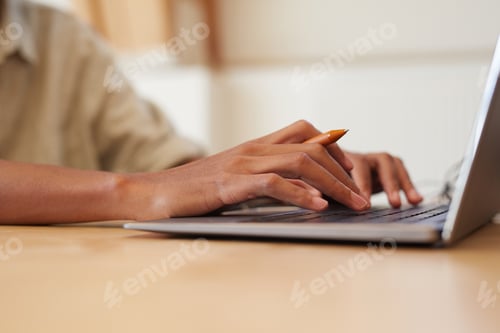 Preview: Man working on laptop