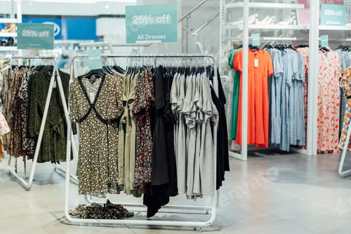 Preview: Seasonal Clothing sale on hanger at the modern shop, mass market. Make Outfit set. Shopping Mall.