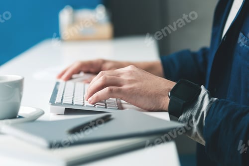 Preview: Skillful Male Freelancer Is Working On Computer