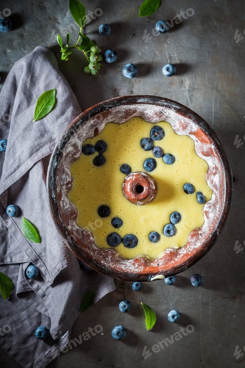 Preview: Preparation for homemade and rustic cake with blueberries